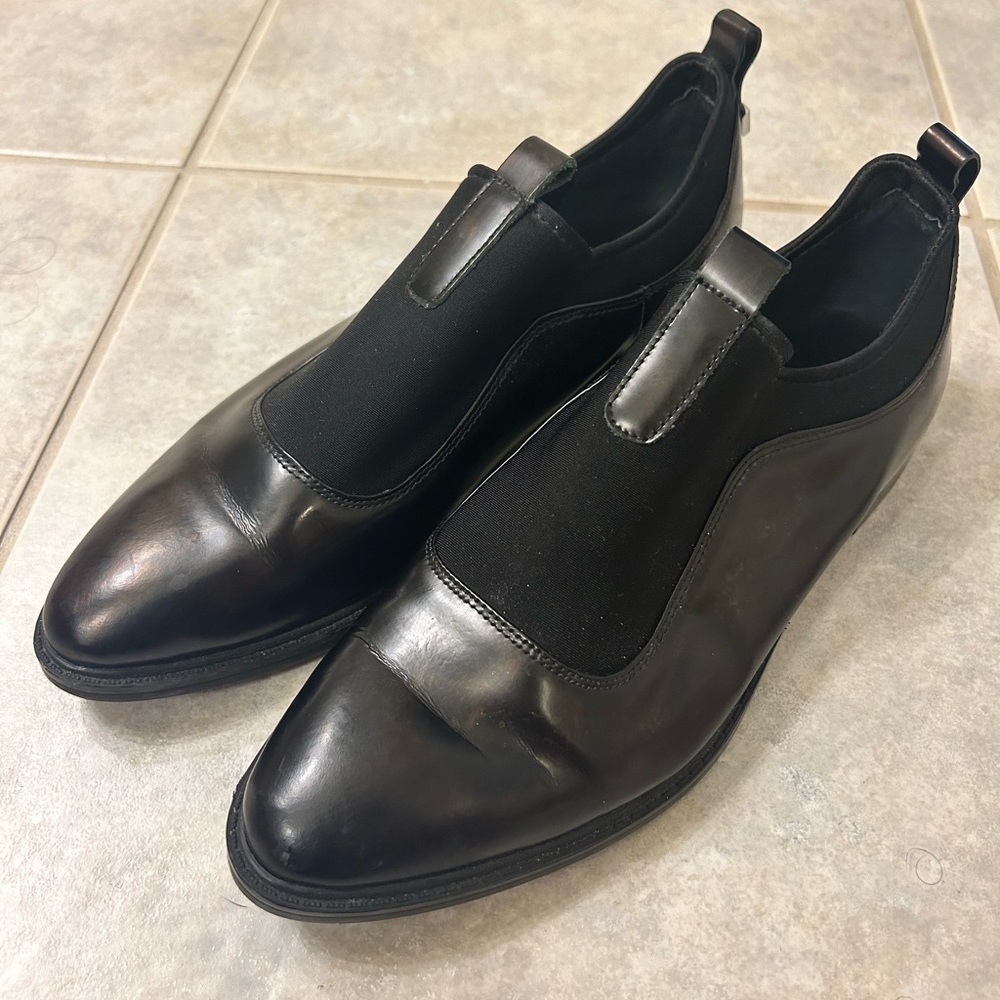 Black Calvin Klein Oxford loafers.
